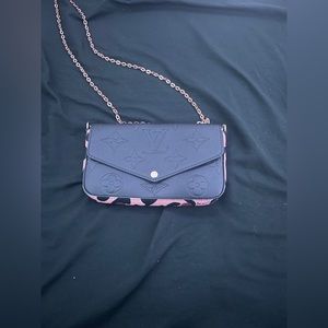 Louis Vuitton pink camouflage purse and wallet